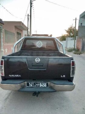 A VENDRE nissan Navara le 10cv tel 23414111