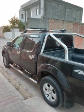 A VENDRE nissan Navara le 10cv tel 23414111